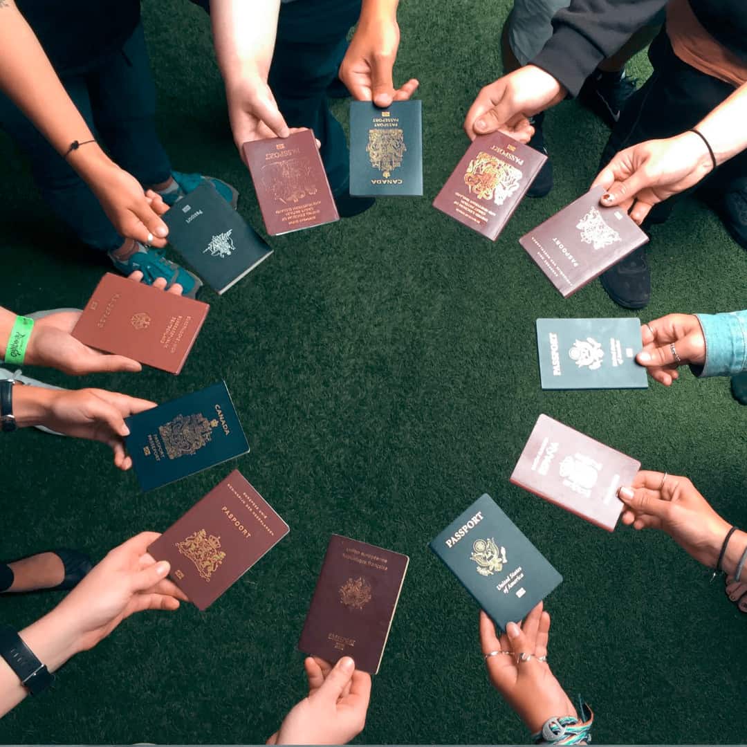Passport from different nationalities on a working holiday visa on a welcome to travel tour