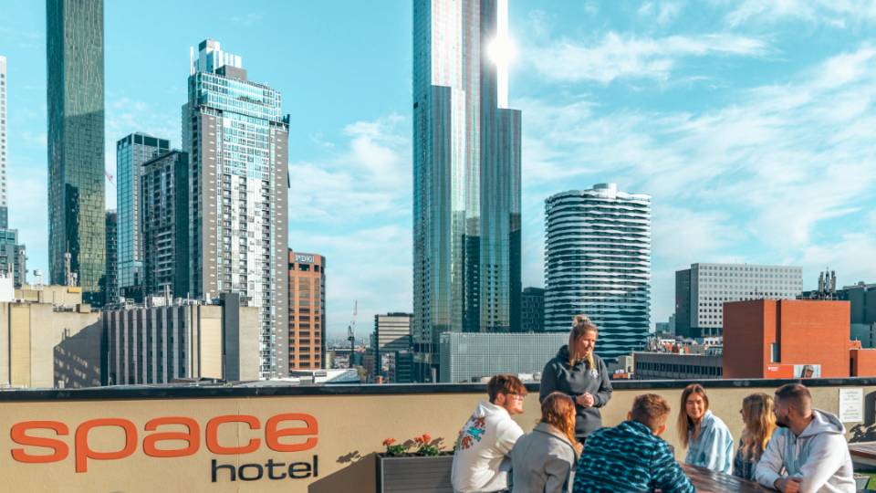 Group enjoying the rooftop view at Space Hotel